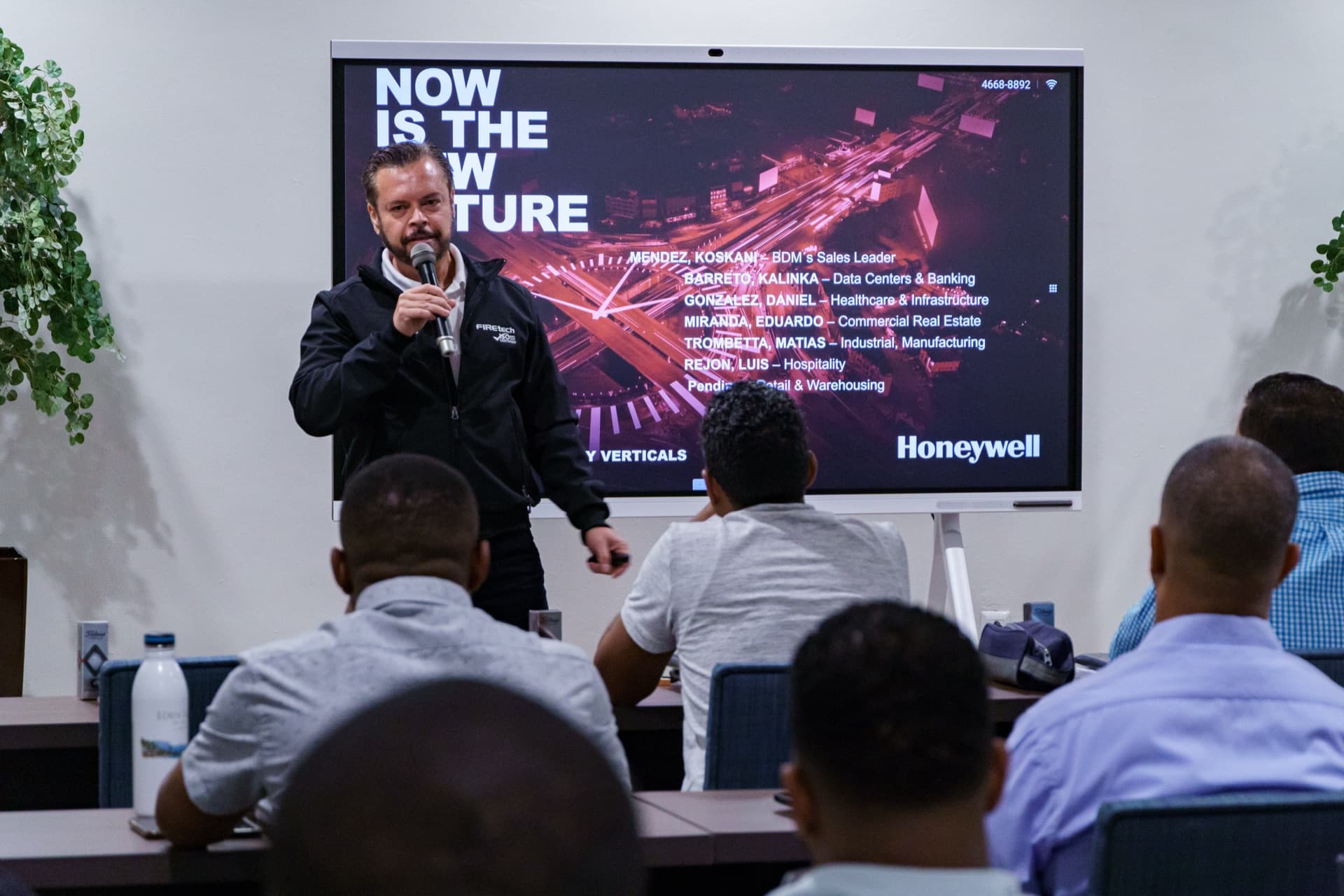 Firetech Academy instructor presenting fire alarm training to attendees